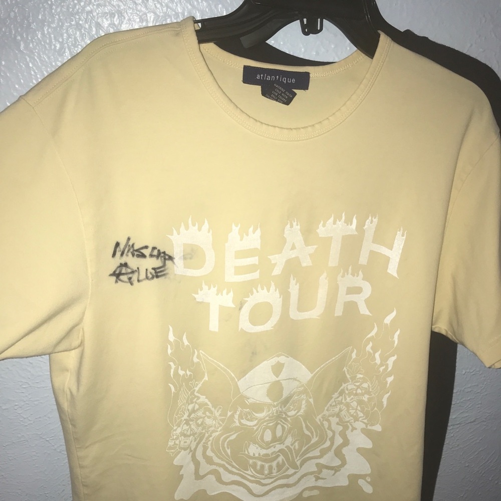 Signs in NASCAR aloe shirt from death tour